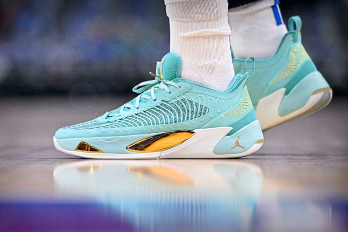 View of Luka Doncic's teal shoes.